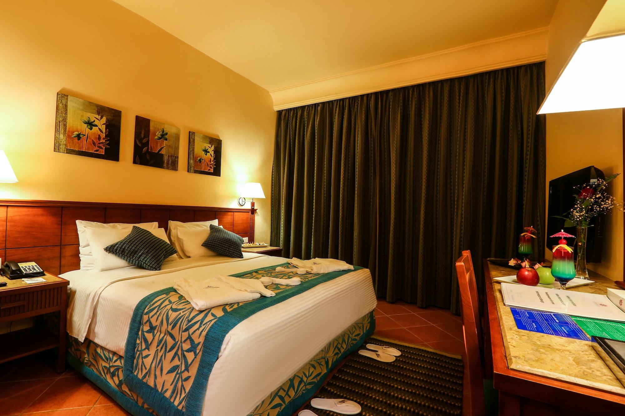 Hotel Charmillion Club Aquapark Sharm El-Sheikh Exterior foto A bedroom at the hotel